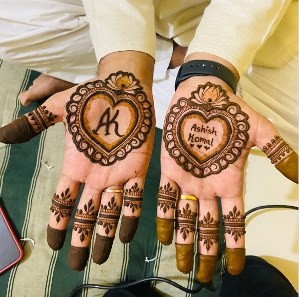 heart-shaped mehndi for groom