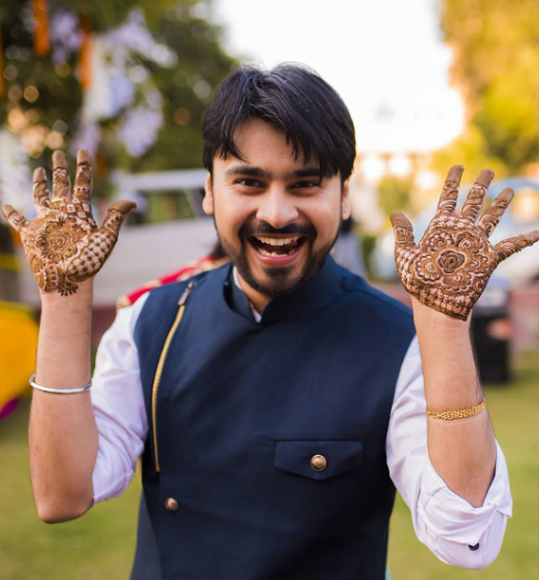 Full-hand mehndi designs for groom